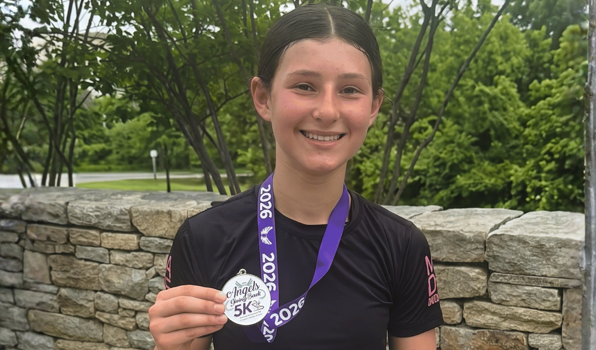 Liliana with AGB 5K medal Liliana with AGB 5K medal
